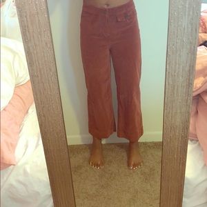 They are like a orange/burgundy bell bottom jean.